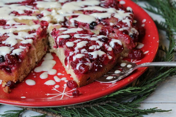 This Gluten-Free Upside Down Cranberry Coffee Cake is made with much less sugar than most recipes. It's a a fun breakfast cake for any holiday occasion. Found at The Happy Housewife